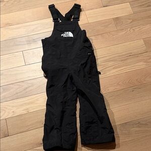 The North Face Kids Black Bib Jumpsuit snow pantsuit